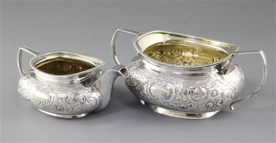 A George III silver sugar bowl and cream jug, by James Turner, bowl height 80mm, weight 17.8oz/556grms.